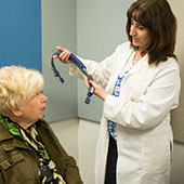doctor checking a patient's hearing