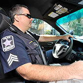 Policeman in a squad car