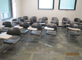 View of chairs with built-in desks.