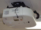 Ceiling-mounted projector.