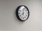 Photo of Frances Searle 1-441 showing a clock on the wall