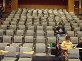 classroom seats and 4 students