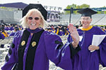 MARCHING ON: Emilie Chaddock Egan ’65,  ’86 JD, left, a Reunion 2015 committee co-chair, marches with the class of 1965 at ­Commencement in June. 