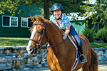 Jana Cohen Barbe ’84 rides Strudel at Henley Farms, her 80-acre equestrian ­facility and working farm in ­Lexington, Ky. Barbe, a business lawyer for nearly 30 years, is a Chicago-based partner and global vice chair at Dentons law firm.