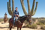 Bryan West ’11 tours the ­Sonoran Desert on his horse, Josie. West is an “­Explore ­Arizona” multi­media ­journalist for KPNX, the NBC affiliate in ­Phoenix. His weekly stories showcase the diversity and natural beauty of the state.