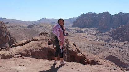 Student with a camel in Jordan