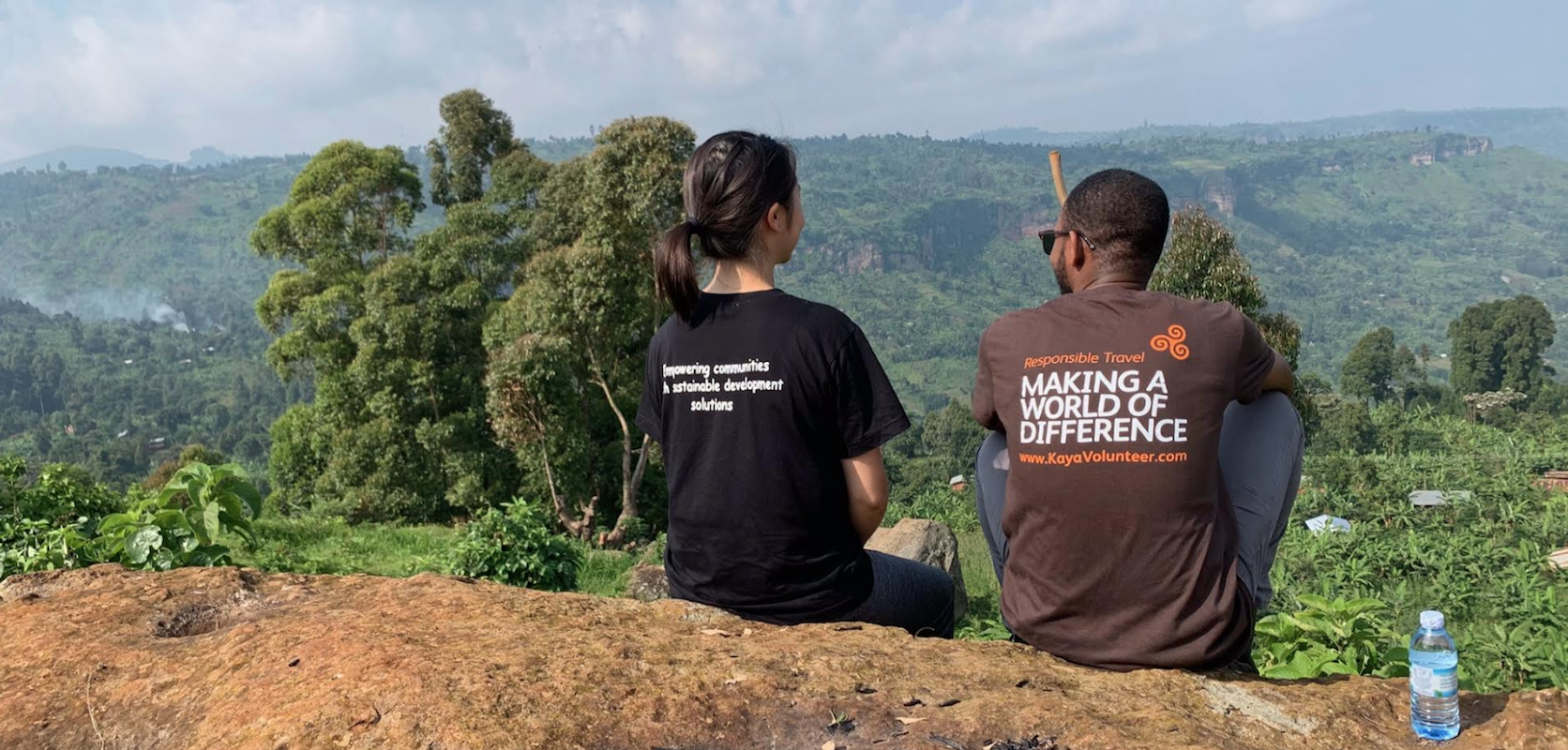 Students overlooking forests of Uganda