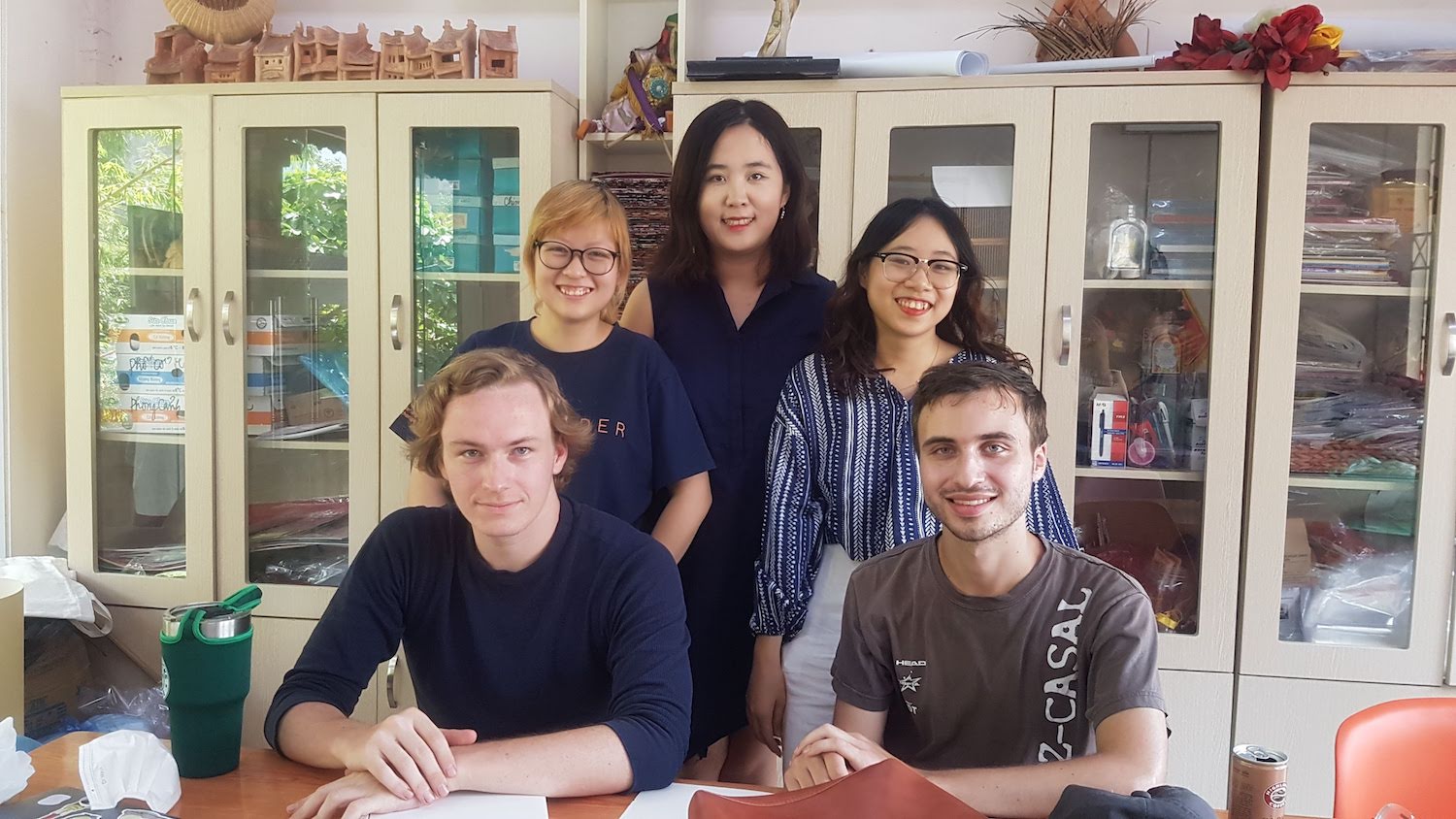The GESI internship team at Vụn Art, comprised of three Northwestern students and two local college students