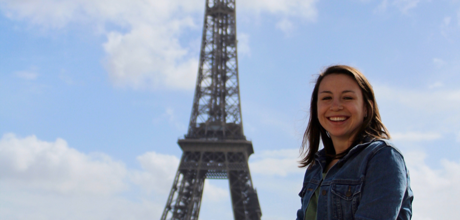 Student in front of the Eiffel Tower