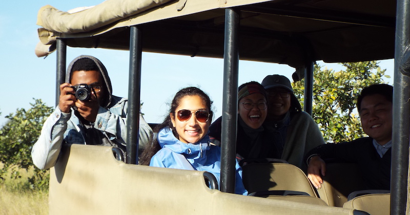 Student taking photograph in Kruger National Park near Stellenbosch, South Africa