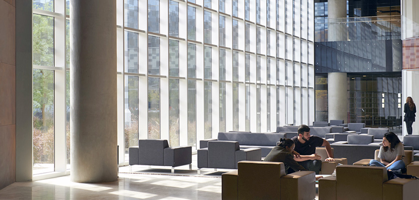 students seated in atrium