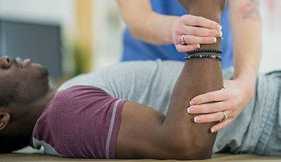 man getting arm checked