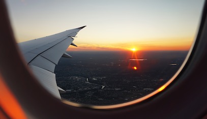 Setting sun from an airplane window