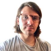 Shawn Bush, Program Manager. A white male with long hair and glasses.