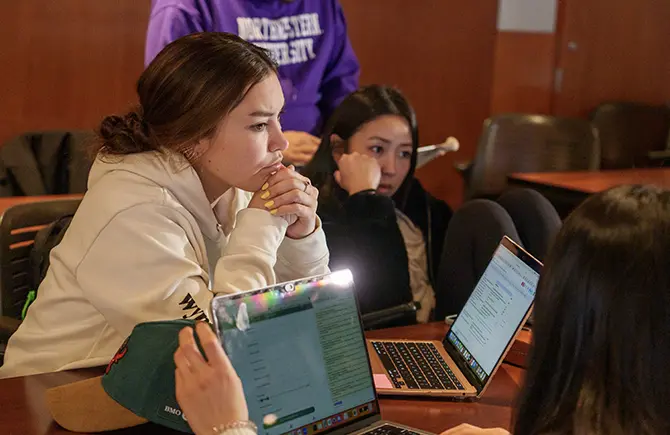 students working on laptops