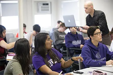 students in a classroom with a professor