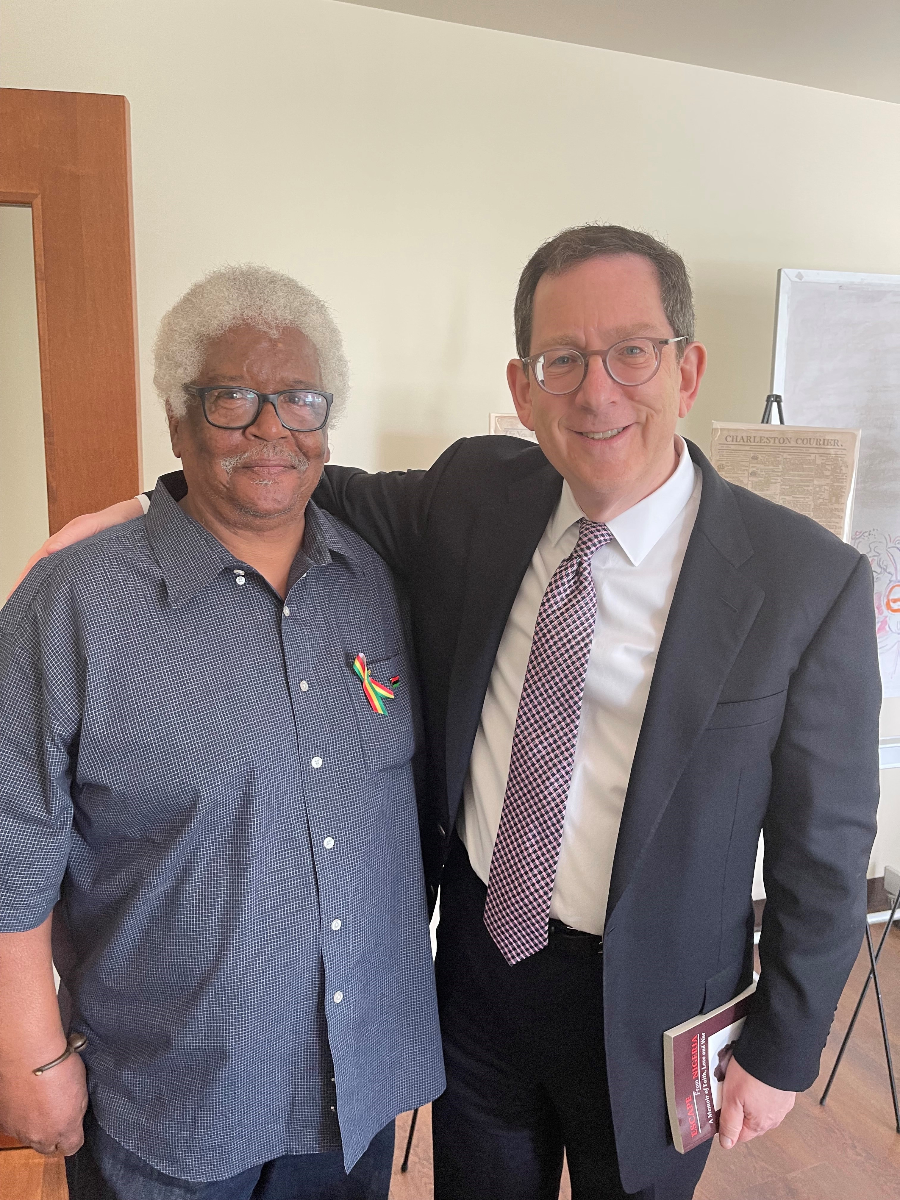 Michael Cowan and university president Schill
