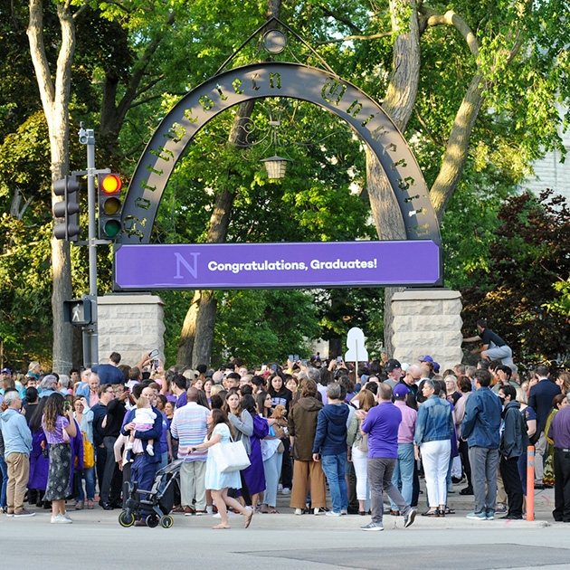 students and families at the Weber Arch