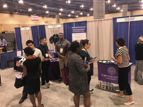 Students networking at ABRCMS