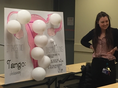 Julia presenting her fertilization dart game