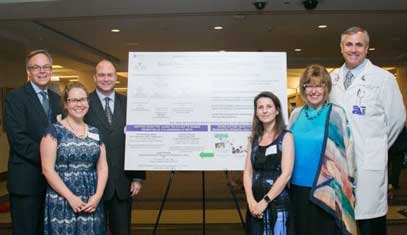 students with research poster