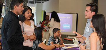 students and staff at an SES event