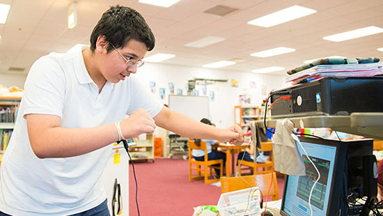 student looking at a monitor