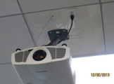 Ceiling-mounted projector.