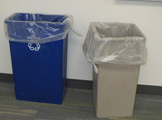 Trash and recycling bins.