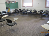 Arrangement of chairs around the classroom.