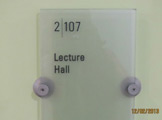Photo of Frances Searle 2-107 label outside the room