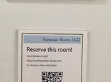Picture of a sign that says Reserve this room