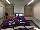 Picture of the front of the room and the projector and instructor's podium
