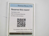 Picture of a sign that says reserve a room