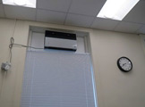 Photo of a projector inside locy hall room number 106
