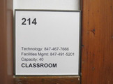 Photo of locy Hall Room Number 214 label outside the room