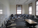 Photo of locy Hall Room Number 301 showing chairs from front