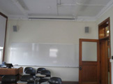 Photo of locy Hall Room Number 301 showing whiteboard
