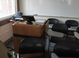 Photo of locy Hall Room Number 301 showing podium