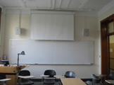 Photo of locy hall room number 303 showing whiteboard
