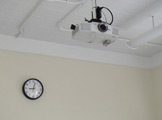Photo of locy hall room number 303 showing a projector