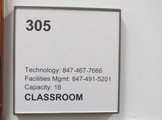 Photo of locy hall room number 305 label outside the room