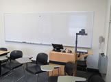 Photo of locy hall room number 305 showing a whiteboard