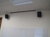 Photo of locy hall room number 305 showing sound speaker
