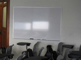 Photo of locy hall room number 318 showing a whiteboard