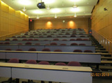 Rows of auditorium seating.