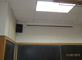 Overhead light, blackboard.