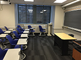 student desks and blackboard