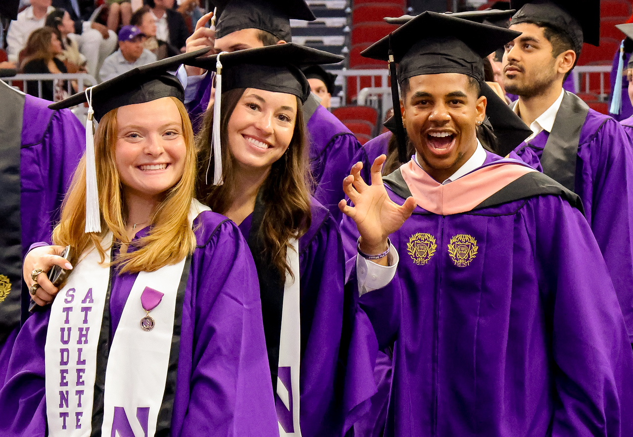 graduates at the arch