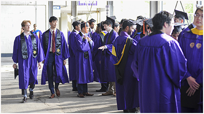 students preparing for procession